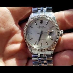Rolex date with diamond bezel